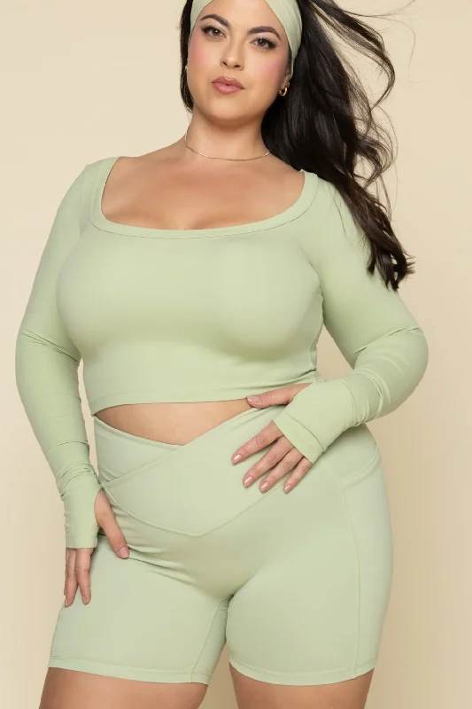 Yoga Shorts for Daily Flexibility -Crisscross Hourglass® Midi Short with Pockets - Pistachio
