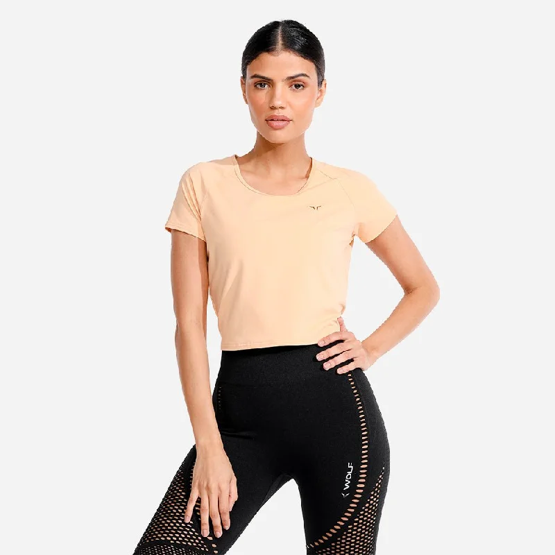 Yoga Tops for Hot Yoga and Intense Practice -Evolve Crop Tee - Apricot