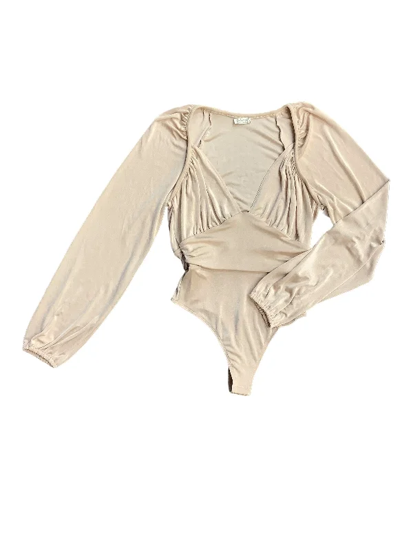 Best Yoga Sets for Women -Cream Bodysuit Free People, Size M